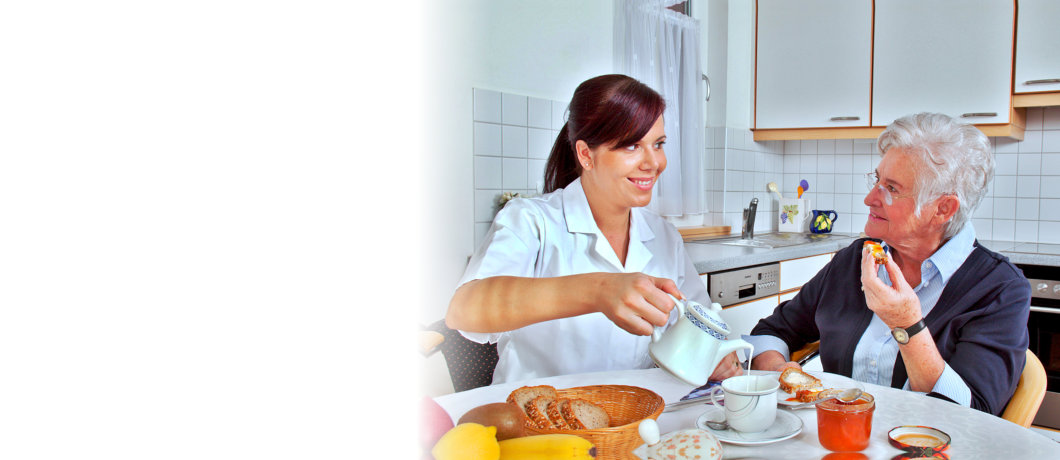 caregiver is preparing meal for her patient